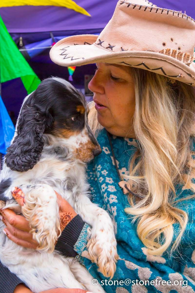 Festival guest in colourful surroundings.